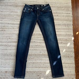 Miss Me size 27 mid rise skinny Jean. Dark Wash. Mint Condition!